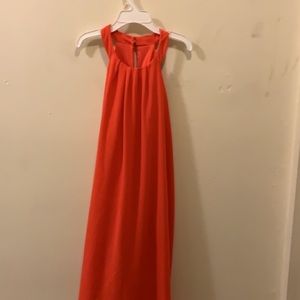 This a medium size coral color dress